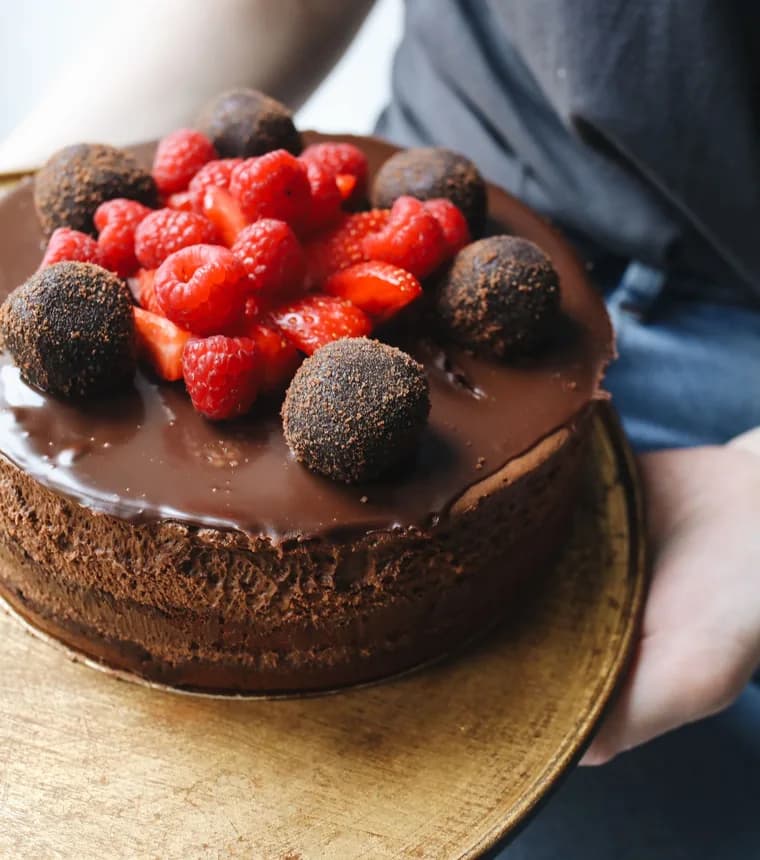 Chocolate truffle cake with a glossy ganache finish and berries, baked in Jhikargacha by Made by Roshni Chocolate truffle cake with a glossy ganache finish and berries, baked in Jhikargacha by Made by Roshni